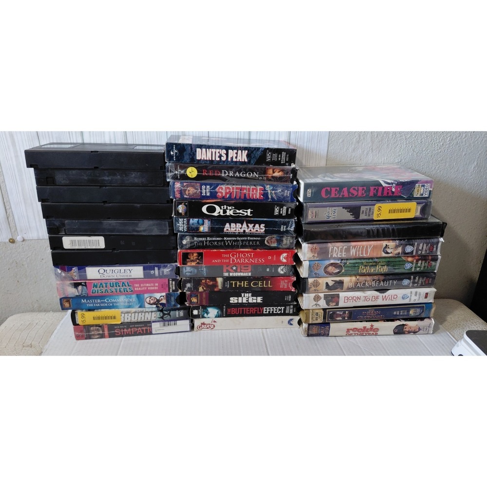 VHS Lot Of 32 Collectible Media Mixed Movies Untested Some Water Damage "As Is"